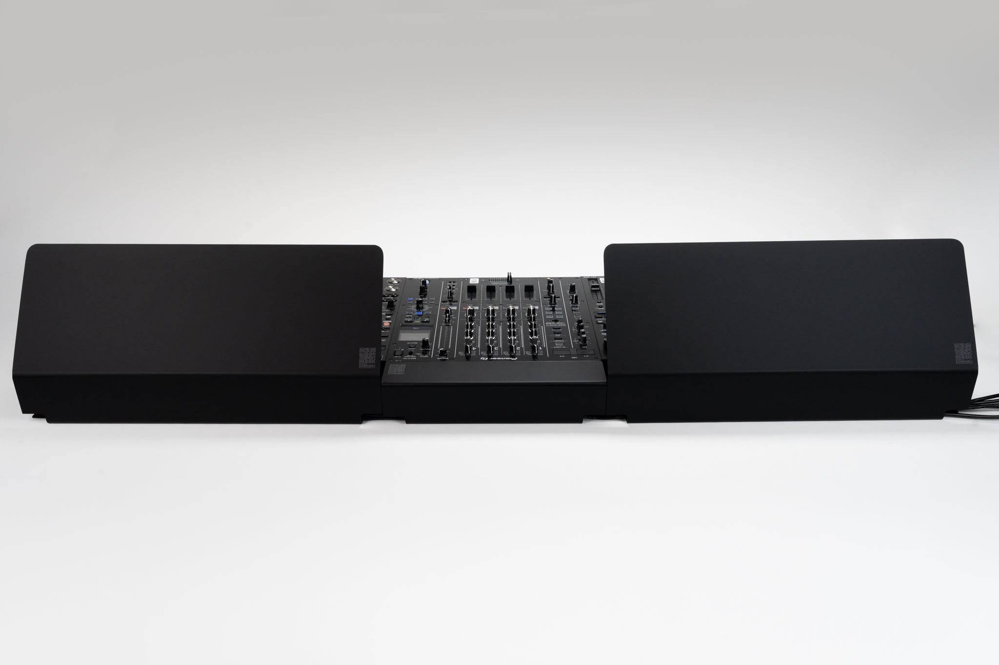 Clean DJ booth with Pioneer DJM-A9 and cable covers